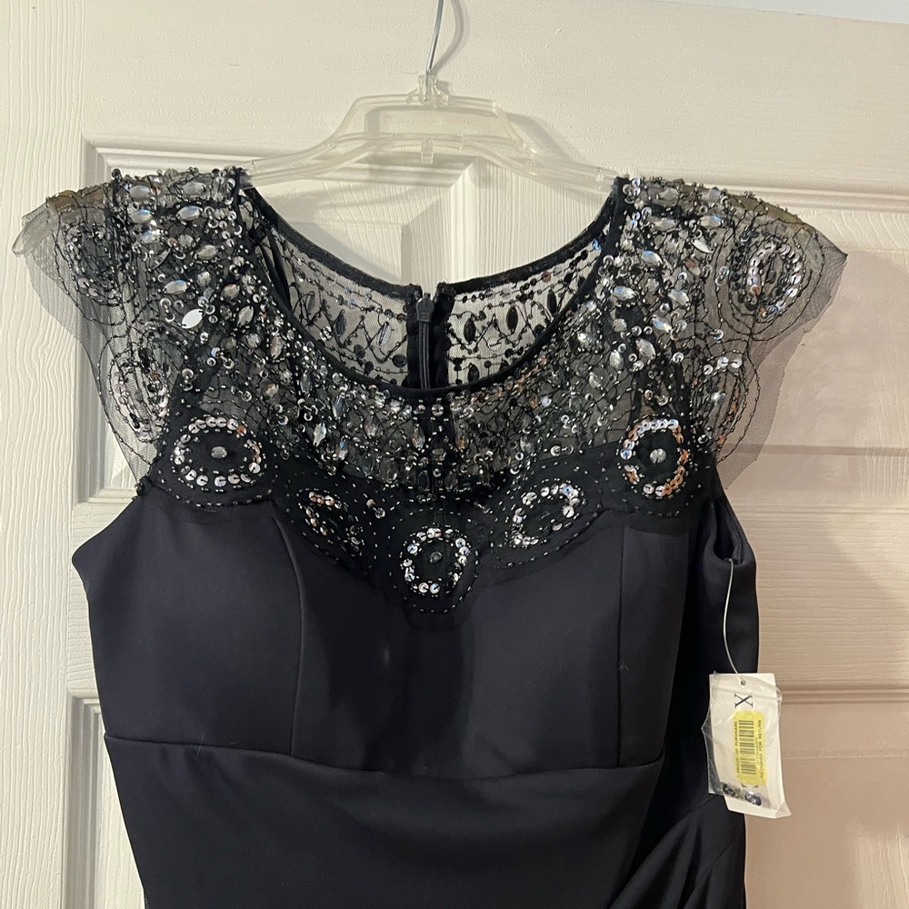 NWT Black Xscape knee length dress with beaded neckline
